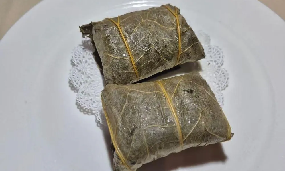Stuffed Grape Leaves wrapped grape leaves with rice and herbs at Bamboo Cafe, a Chinese Restaurant restaurant in Glendale