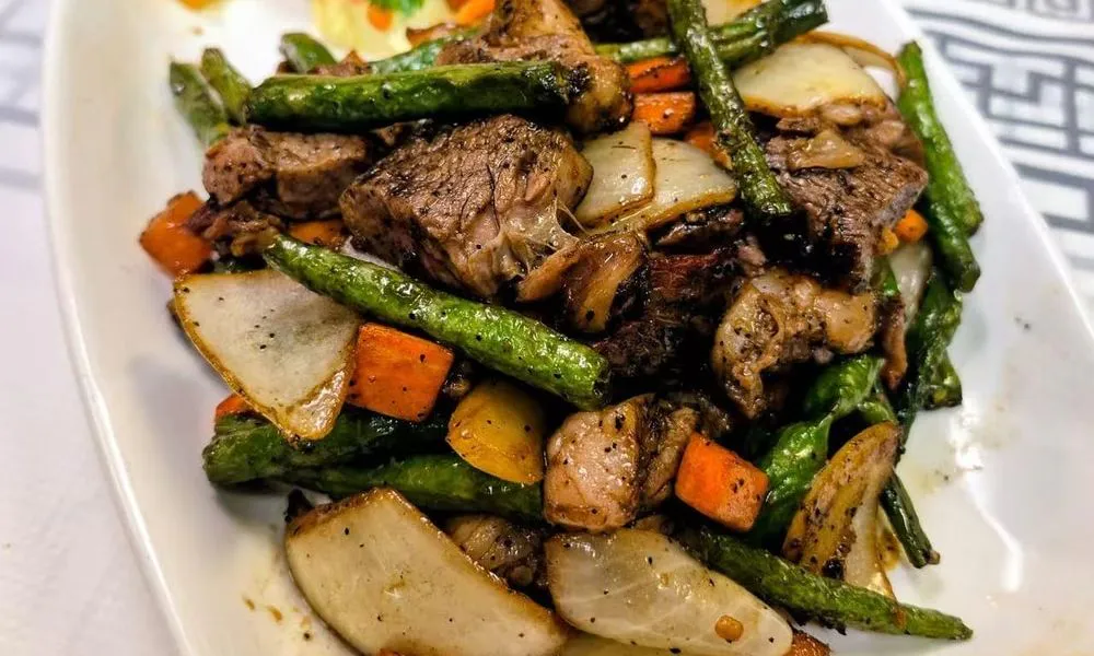 Beef and Vegetable Stir-Fry Savory beef and vegetables including asparagus, carrots, and potatoes at Bamboo Cafe, a Chinese Restaurant restaurant in Glendale